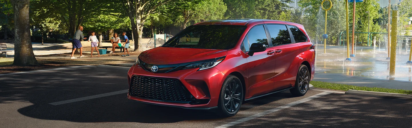 a red 2025 Toyota Sienna LE