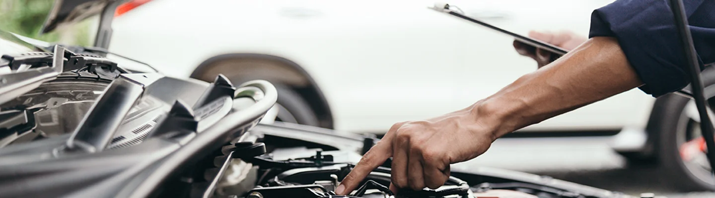 tech working on engine