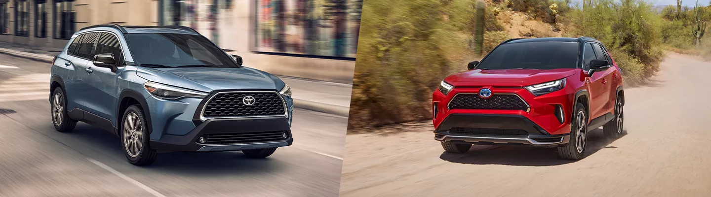 Side by side front view of a new Toyota Corolla Cross and a used Toyota RAV4