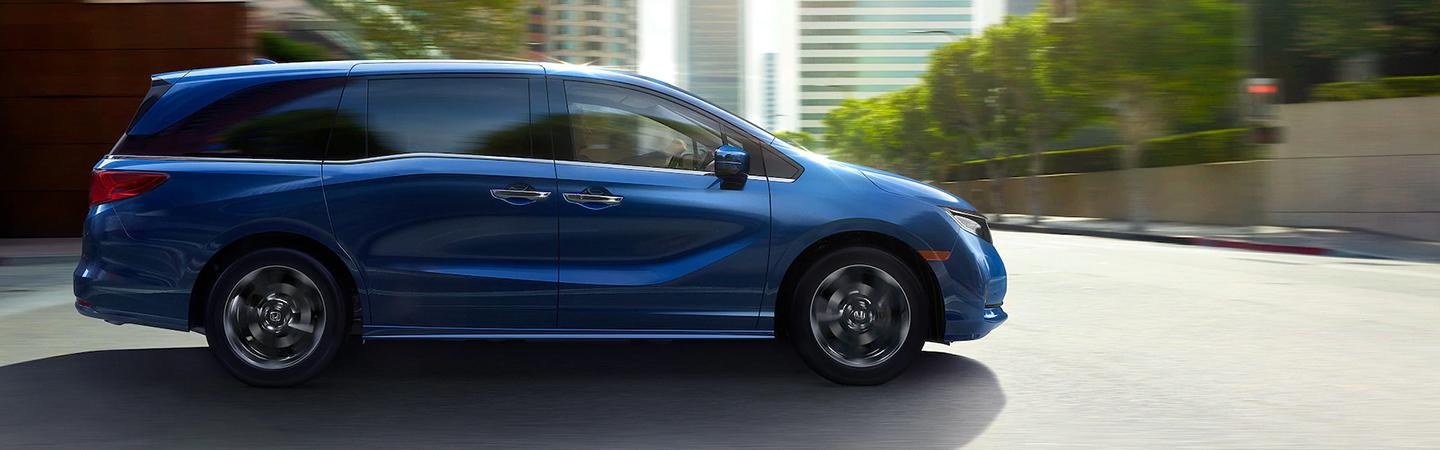 Side view of a 2021 Honda Odyssey in motion