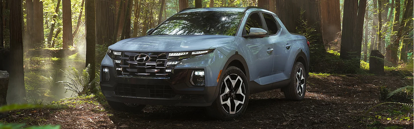 2024 Hyundai Santa Cruz vs Ford Maverick front side in grav colour 