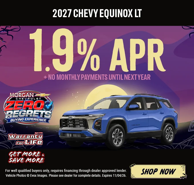 2027 Chevy Equinox LT – 1.9% APR plus no monthly payments until next year. Blue Chevrolet Equinox SUV with the Chevy bowtie logo, shown against a Halloween night background with a full moon. Includes a "Home of the Warranty for Life" logo and a "Get More & Save More" badge. For well-qualified buyers only; requires financing through a dealer-approved lender. Vehicle photos © Evox Images. Please see dealer for complete details. Expires 11/04/26. Shop Now.