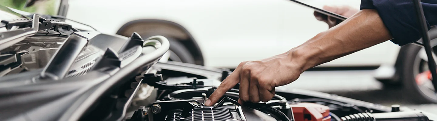 Service technician inspects a Hyundai vehicle