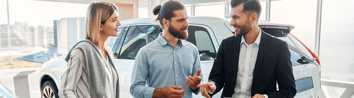 Customers speak witha car salesperson at the Brandon Hyundai dealership