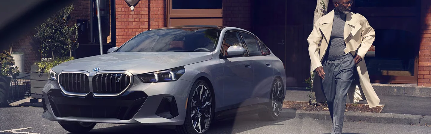 2025 BMW 5 Series 530i parked in city