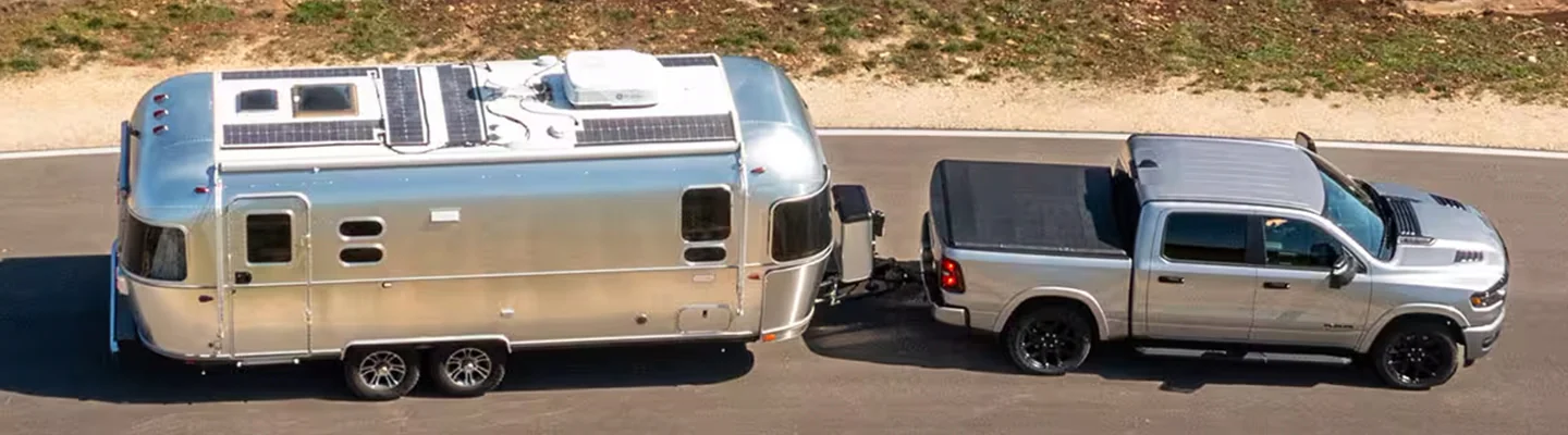 2025 RAM 1500 towing a camper