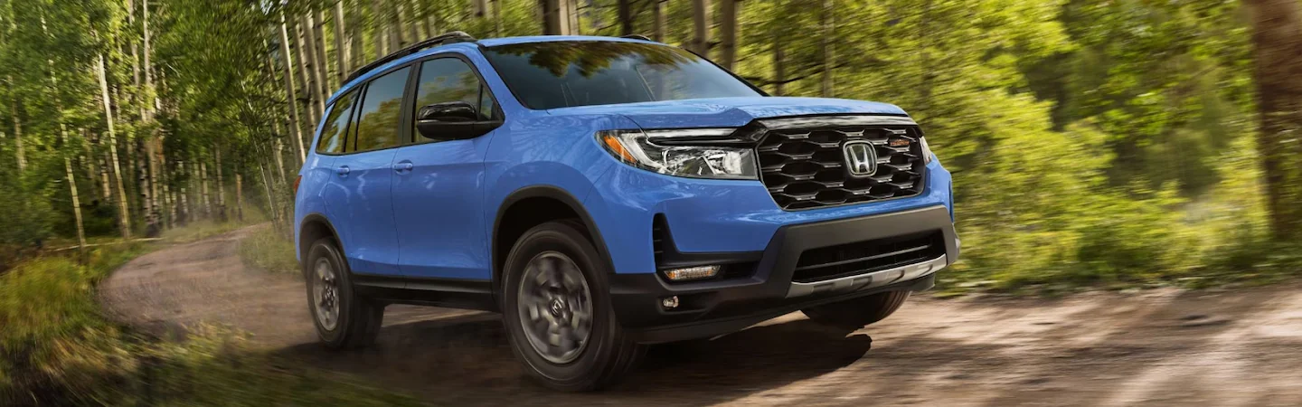 Honda Passport driving on road