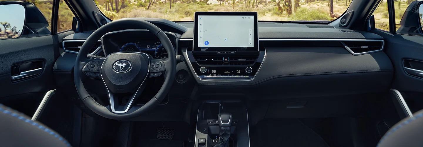 Interior view of the 2026 Toyota Corolla dashboard and its tech