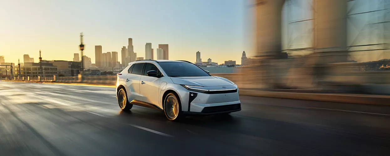 Toyota Hybrid Vehicle view from front driving in the city