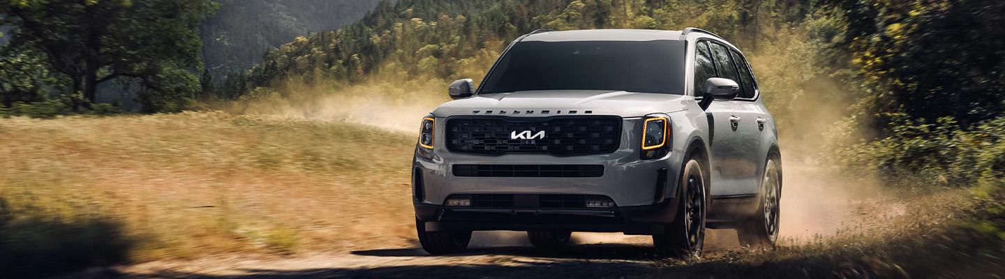 2022 Kia Telluride driving on a dirt road