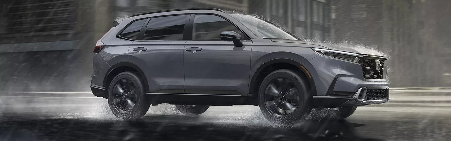 2026 Honda CR-V Hybrid driving in the rain