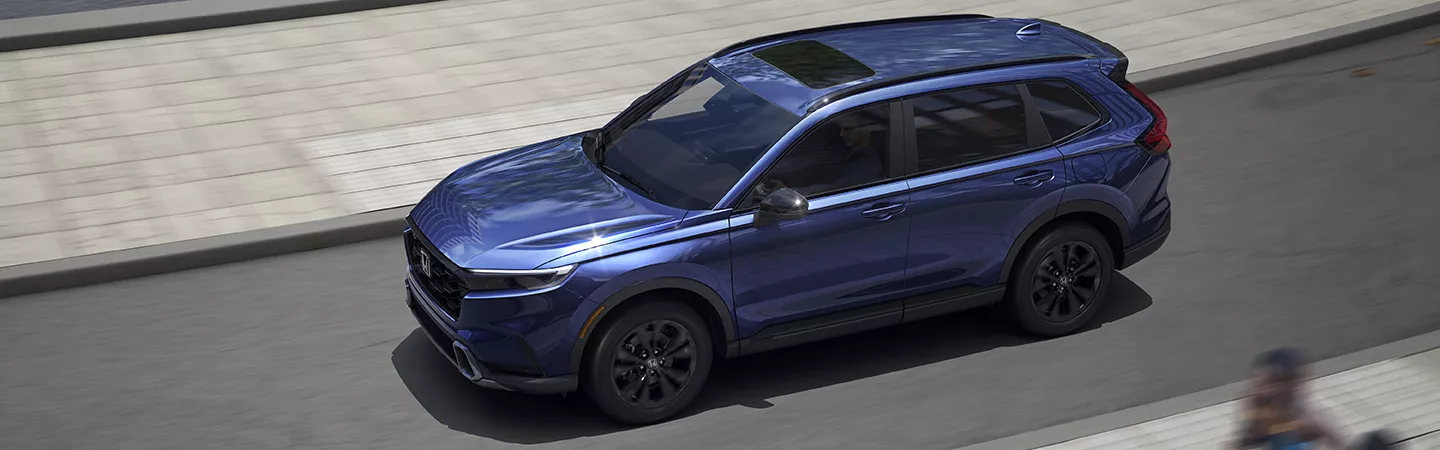 2026 Honda CR-V Hybrid parked on a city street
