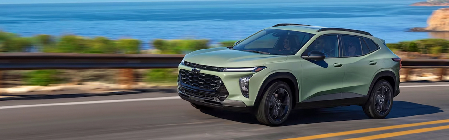 2024 Chevrolet Trax vs Ford Escape green sideview