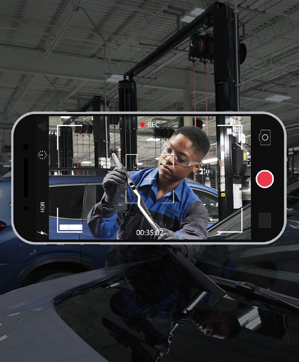 video showing mechanic working on a vehicle