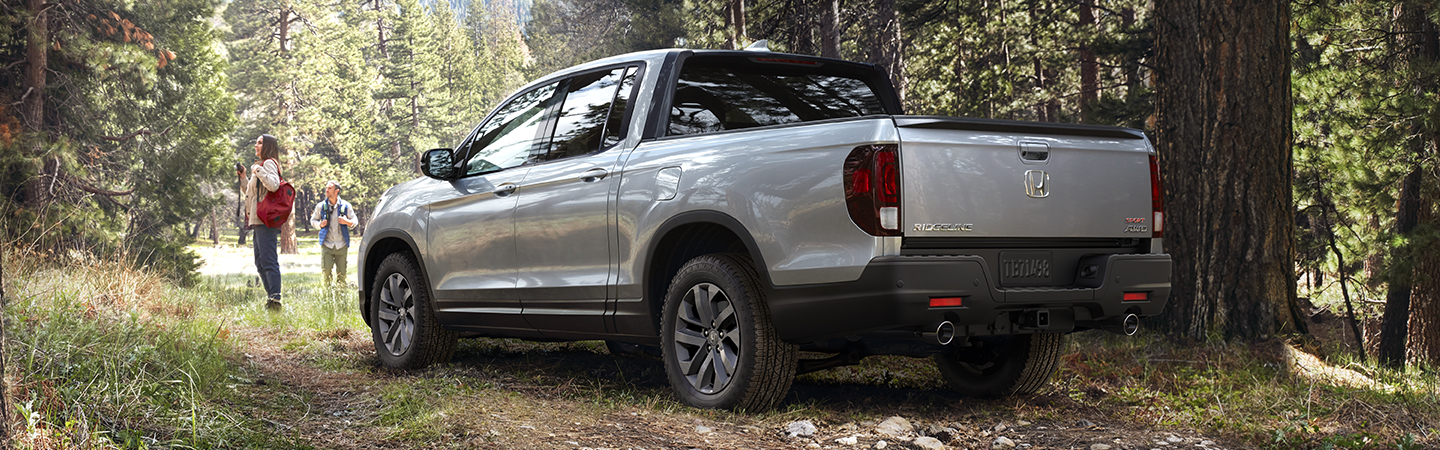 White 2023 Honda Ridgeline rear view