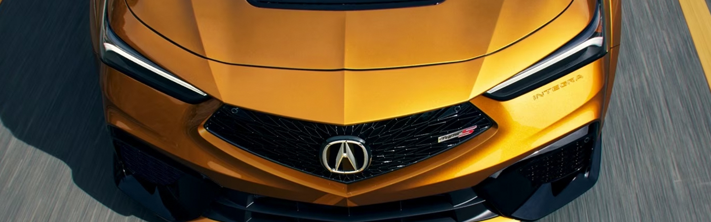 2024 Acura Integra vs 2023 Integra yellow frontview