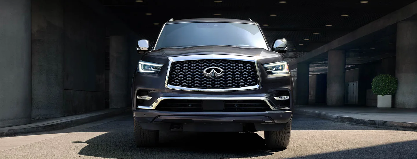 Parked red 2023 INFINITI QX55