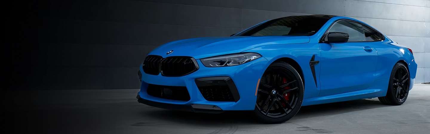 2024 BMW 8 Series Specs blue sideview