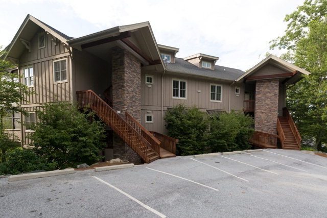 This beautiful upper level condominium has an outstanding view in Old Edwards Club at Highlands Cove! Tongue & Groove vaulted ceilings. Granite countertops, hardwood, tile and carpet flooring, 2 fireplaces one on screened porch. Please stop by sales office for information on Old Edwards Club amenities.