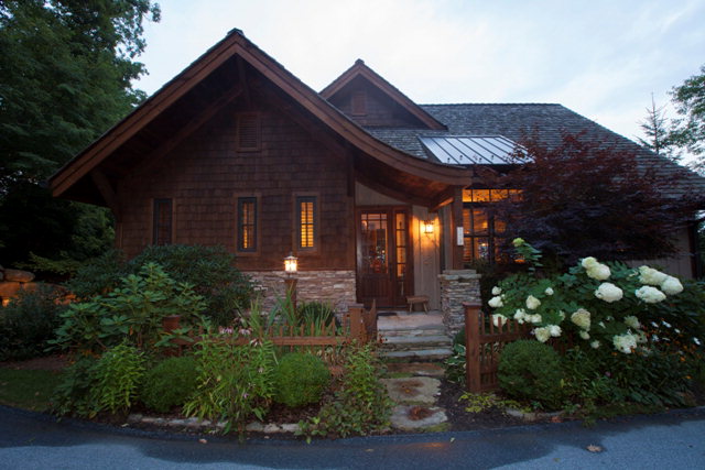 This beautifully landscaped cottage is very private with a gorgeous mountain view. 2 fireplaces one on screened porch and one in main level living room.
