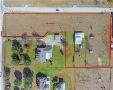 2.62 acres with 700+ road frontage located on Katy Hockley Cut Off Road and Salt Grass Trail Way. UNRESTRICTED- can be used for residential or commercial. This property is fenced, cleared with a few trees and barn, AG exemption and easy road access to I-10, Grand Parkway, and minutes to Katy stadiums. Sold As Is raw property. DID NOT FLOOD during Hurricane Harvey.