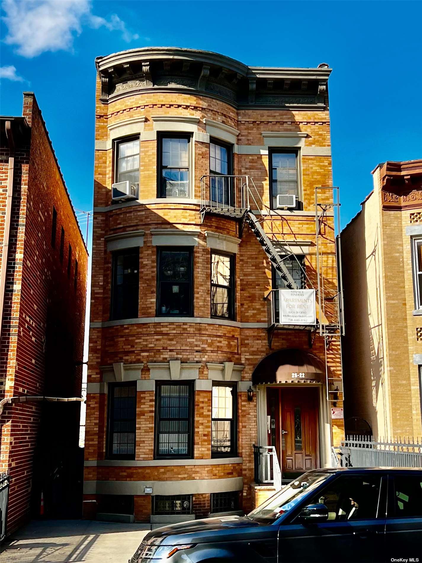 This 5-unit multi-family building in Astoria, New York is a fantastic investment opportunity for those looking for a property with great potential rental income. The building is situated in a prime location that offers a stunning view of the New York City skyline. It also includes two parking spots, making it a great selling point for tenants with vehicles. The building is in close proximity to public transportation, making it convenient for tenants to travel around the city with ease. The Astoria Boulevard subway station (N/W line) is just a few blocks away, and there are several bus stops nearby as well. The location is also walking distance from major retailers, providing tenants with easy access to shopping, dining, and entertainment options. Each unit in the building is thoughtfully designed and well-maintained. They feature modern appliances, high ceilings, and large windows that allow natural light to flood the living spaces. The building has been updated with central air and heat, ensuring that tenants can stay comfortable year-round. Overall, this 5-unit multi-family building in Astoria, New York is a great investment opportunity for those looking to enter the rental market. Its prime location, modern amenities, and stunning view of the city make it an attractive option for potential tenants.