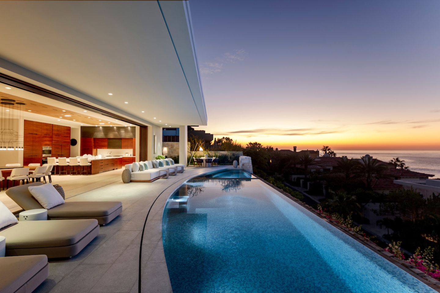 Located within walking distance of the Beach Club, this spectacular 7-bedroom 9-bath home features custom details and luxury finishes. The open floor plan allows for multifunctional use, and is complemented by a state-of-the-art chef’s kitchen and a large living area that leads to the patio. The outdoor living space is an amazing setting for the swimming pool that overlooks the beach. This beautiful home also features a gym, a roof-top deck with a breathtaking view of the Sea of Cortez and a home theater. All of these amenities and more round out this impressive home. 