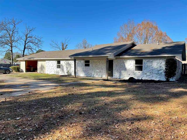 This home has been remodeled with new windows, 2 new water heaters, flooring, paint and much more. Large fenced yard. The home has three car garage with bathroom in the garage. Two new garage doors with motors and remotes will also be installed.