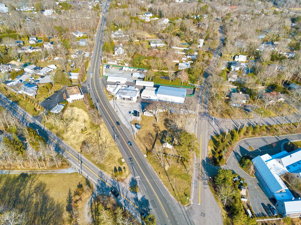 Extremely unique commercial/mixed use property with 1,070 feet of road frontage. High traffic location in the heart of The Hamptons. Currently being run as a boat storage facility with onsite mechanic, paint shop, detail shop, tile shop, multiple storage buildings, legal residential cottage and legal residential two-family home. The following includes yearly taxes, monthly costs and rent rolls. Yearly taxes - $14,388.76 | Water, electric and oil - $2,017.60 per month. Main butler building $15,000 per season | Tile shop $1,950 per month | Detail shop - $1,500 per month | Paint shop $1,500 per month | Storage building #1 $500 per month | Storage building #2 $500 per month | Studio apartment $900 per month.
