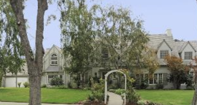 Located on an expansive lot on one of Santa Monica's premier streets, this exceptional traditional home has a gracious center hall entry. The step down living room is flanked by over sized windows and French doors to the patio, creating a light-filled ambiance. The den off the living room is also an ideal office. The formal dining room leads into the family room/kitchen combination, which has been remodeled. There are four bedrooms + 3 baths upstairs. A fifth bedroom was converted to a laundry/craft room. The master suite has an additional sitting room and ample closets. Many beautiful details including hardwood floors, lovely garden, and flagstone patio. Located in the Franklin School district and minutes from Montana Avenue with its shops and restaurants.