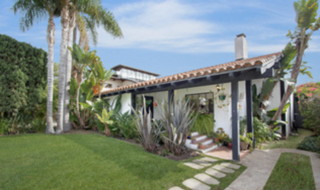 Rarely does the unique opportunity occur to live two blocks from the Palisades Bluffs overlooking the Pacific Ocean, north of Montana. The hacienda style home features a living room with high ceilings and a fireplace, a master suite with pitched ceiling, a separate dining room opening to an interior courtyard, and a kitchen/family room combination, opening to the rear yard. There are two additional bedrooms sharing a bath. The lot is deep, with garage access off the alley. There is a sports court with basketball hoop attached. Located in the Roosevelt Elementary School district.
