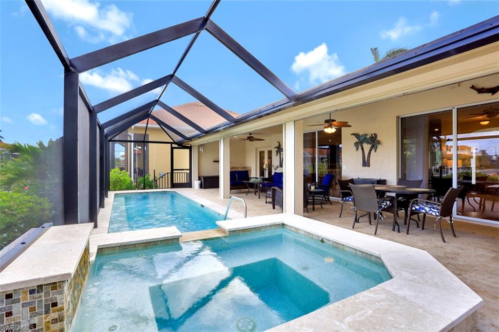 Represented the Buyer - Here’s the bottom line: lovely, amenity-filled, waterfront home with beach access under a mile away. Its split-bedroom floorplan includes a main living area with vaulted ceilings that leads into a coastal white kitchen with many features. The primary bedroom features French doors leading to the lanai, a spacious walk-in closet, and a bathroom with dual sinks and a tiled walk-in shower. The additional two bedrooms are on the opposite side with the guest bathroom nestled between. The garage has a separate area that is perfect for a workshop with doors leading to the backyard. The lanai features a pool/spa overlooking the canal, a covered seating area with sink and counterspace, an outdoor shower, and electric hurricane shutters. The newly installed composite dock decking includes a 10,000-lb boat lift, floating dock, quick boating access to the Gulf, and more. The home sits on a corner lot, which provides additional fenced-in acreage. The home features a newer roof and is also a short distance to the Marco Walk Plaza, offering numerous chic dining and shopping options, and a movie theater. With a strong rental history to boot, you cannot go wrong, whether for enjoyment or investment!