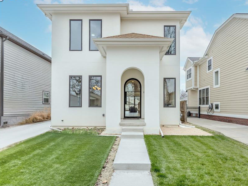 Built by AG Design in 2025, this exceptional Modern Tudor blends timeless architecture with sleek contemporary design, high-end finishes, and curated throughout. Striking curb appeal makes a lasting first impression and sets the tone for the elegance found within. The foyer welcomes you with stunning flooring, leading to a sophisticated library or home office. Designed for both comfort and refined living, the open concept main level showcases a show stopping island kitchen featuring custom european cabinetry, and an inset wet bar. The inviting living room is anchored by a statement fireplace, with a door wall that opens seamlessly to the backyard patio. The adjacent dining area connects effortlessly to both the kitchen and living space, creating an ideal layout for entertaining. A thoughtfully designed mudroom at the rear of the home provides convenient access to the backyard. Upstairs, the luxurious primary suite offers a private retreat, complete with a spacious walk-in closet and a spa-inspired ensuite bath featuring wood floors, an oversized shower, dual vanities, and a free standing tub. Two additional bedrooms share a beautifully appointed full bath, while a second-floor laundry room adds everyday ease. The finished lower level enhances the home's versatility with a generous recreation area, a gym or flex room, a fourth bedroom with two egress windows, and a full bath perfect for guests or extended living. Enjoy outdoor living in the private backyard,. A 1.5-car garage offers excellent storage solutions. Ideally located just moments from Downtown Birmingham's premier shopping and dining, this home delivers the perfect balance of luxury, style, and convenience.