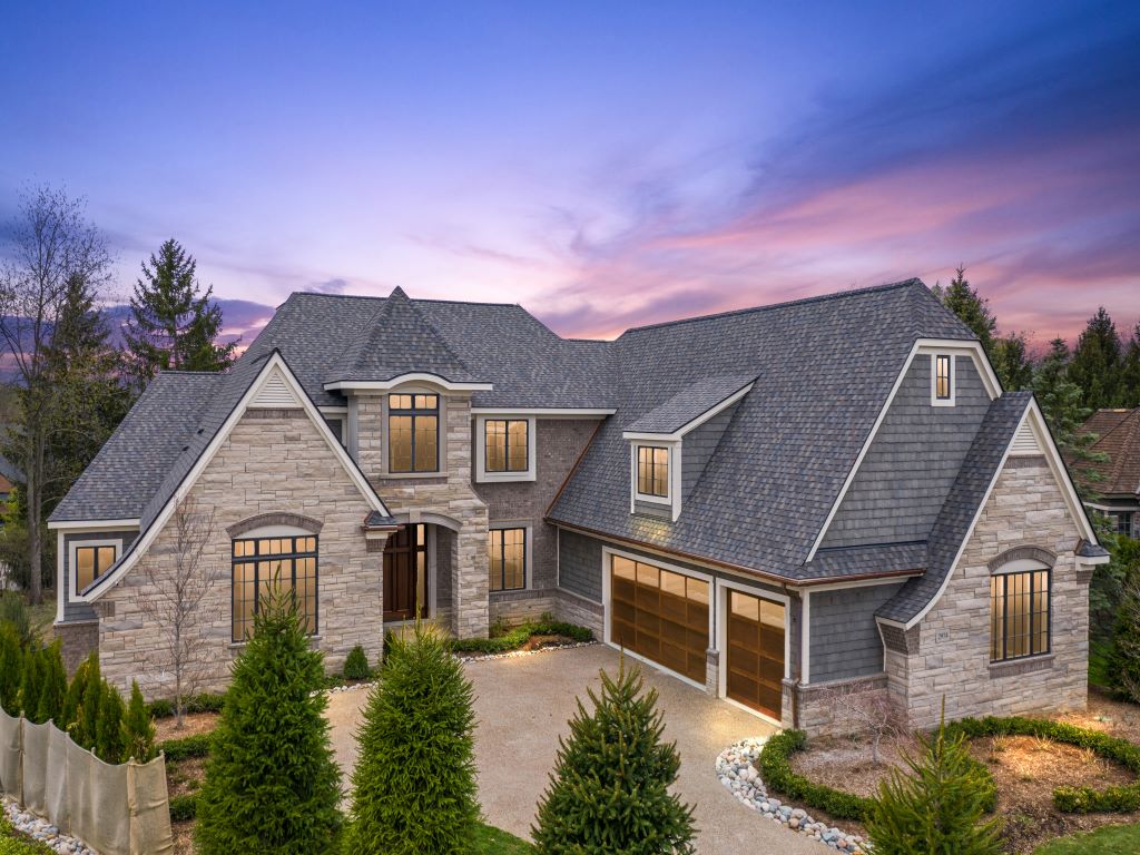 EXQUISITE TUDOR STYLE, ESTATE HOME, OFFERS LUXURY, EXCEPTIONAL CRAFTSMANSHIP & DETAIL, ALL WITHIN THE CONTEXT OF TIMELESS ARCHITECTURE. EXPANSIVE, DOUBLE HEIGHT GREAT ROOM FEATURES DETAILED FIREPLACE. THE GOURMET KITCHEN HAS PROFESSIONAL GRADE APPLIANCES AND IS BEAUTIFULLY SITUATED ADJACENT TO THE KEEPING ROOM AND EAT-IN AREA. DEN / STUDY ON FIRST FLOOR HAS VAULTED CEILING. LUXURIOUS FIRST FLOOR MASTER BEDROOM HAS TRAY CEILING AND THE MASTER BATHROOM SUITE HAS EXPANSIVE WALK-IN CLOSETS. FIRST FLOOR MOTHER IN LAW SUITE FOR A TOTAL OF FIVE SPACIOUS BEDROOMS AND BONUS ROOM ON SECOND LEVEL. 3 ½ CAR GARAGE PROVIDES AMPLE SPACE.  THIS COMMUNITY PROVIDES 24 HOUR GATED SECURITY AND CONCIERGE SERVICES.