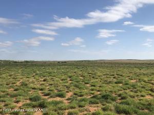 357.507 acres, more or less, of improved grasses fully fenced and cross-fenced rotational grazing. Located just east southeast of Parnell, this entire tract offers excellent grazing as well as dove hunting. The property also bedding areas for deer, wild hogs, quail, and other wildlife. The high points in the center of the property allow for unimpeded scenic views for miles in all directions. 
MINERALS: Subject to any previous reservations. Seller will convey half of any minerals now owned. 
WIND RIGHTS: Subject to any previous reservations. Seller will convey any wind rights now owned. 
WATER: All water rights will convey to buyer. 
IMPROVEMENTS: Electricity, Water Well, underground lines to 2-20'' Fiberglass Water Tanks each equipped with overflow and underground lines to
two Small Retention ponds. Set up for rotational grazing in three pastures of approximately 120 acres each.
FENCES: Excellent perimeter and cross fences are five strand barbed wire with metal t-posts and heavy pipe corners.
FSA BASE ACREAGE: Not in cultivation.
TOPOGRAPHY: Varies with level, slightly sloping and rolling terrain with terraces.
WATER CONSERVATION DISTRICT: Mesquite Groundwater Conservation District
WATER: Well Water located near center of the property with underground lines run to two 20' Fiberglass livestock tanks that that service all three pastures. Tanks are set up to overflow into underground lines to two small retention ponds on the center and north pastures.
UTILITIES: Lighthouse Electric. The property also has access to Red River Water Authority near north property line.
ZONING: Agricultural. Located outside of any municipality.
EASEMENTS: Any easements and/or rights-of-way are not expected to affect the operations of this ranch. Commitment for Title Insurance will identify any existing easements or rights-of-way.
SCHOOL DISTRICT: Memphis ISD
TAXING DISTRICT: Taxes for 2020 were $918.06 with Agricultural Value Exemption
HUNTING LEASE: None.
GRAZING LEASE: None. Cattle removed in mid-March.
POSSESSION: Upon Closing and Funding.