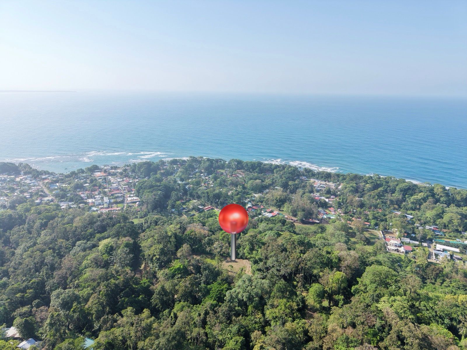Ocean view property.

Located in the very center of Puerto Viejo de Talamanca, this exceptional ocean-view lot offers one of the last remaining opportunities to develop in one of Costa Rica’s most vibrant Caribbean destinations. The property sits on an elevated hillside with a natural terrace perfectly suited for construction, allowing breathtaking panoramic ocean views of nearly 180 degrees. From the property, you can admire Puerto Vargas, part of the renowned Cahuita National Park, as well as the charming town of Puerto Viejo surrounded by lush tropical forest. The combination of ocean scenery, dense greenery, and Caribbean atmosphere creates a truly unique setting. Its strategic location near downtown Puerto Viejo allows future visitors to fully experience the authentic Afro-Caribbean culture, local cuisine, beaches, nightlife, and tourism activities that make the area famous worldwide. This lot is ideal for developing: -A boutique hotel with ocean views -Luxury vacation villas -Eco-tourism accommodations -A wellness or retreat center -An exclusive investment project With very few ocean-view properties remaining in Puerto Viejo, this is a rare investment opportunity in one of Costa Rica’s fastest-growing tourism destinations. Ready to Invest in Puerto Viejo? Properties with panoramic ocean views and central location are becoming increasingly rare in Puerto Viejo de Talamanca. This lot offers the perfect balance between nature, tourism potential, and Caribbean lifestyle.

