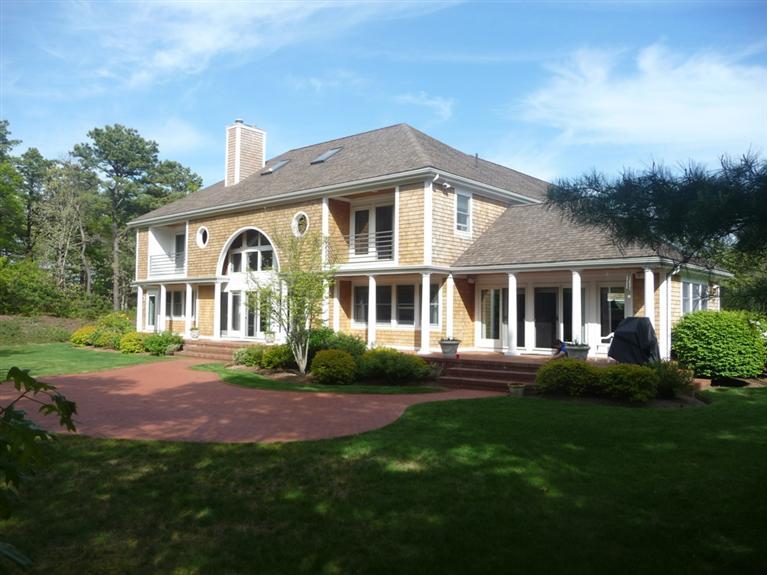 This Dramatic Blend of Traditional and Contemporary Architecture has a California Flare and Nautical Theme. The quality build of this home with its open floor plan is evident throughout. The cherry wood floors, cherry kitchen cabinets, granite countertops, stainless appliances, 2 dishwashers, remotely operated skylights are only some hints of the thought that went into the design of this unique home. Definitely for those who love to entertain indoors and out, and enjoy the privacy of this quiet Ballymeade address. Professionally landscaped grounds extend to the tip of the private golf course. Wonderful deck extends the full rear of this home with access from kitchen, dining area, living room and first floor Master. Second floor masters have there own private balconies. This rare find in Ballymeade is priced right and is a must see.