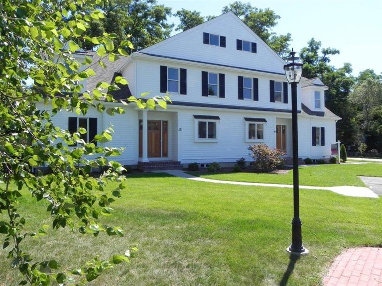 New under construction, custom luxury extras added, sun filled 3 BR, 2.5 bath townhouse condo in West Falmouth. Close to quaint historic West Falmouth Village and harbor near Chapaquoit and Old Silver beaches and steps to the bike path. First floor master suite, tiled shower with glass door($2,000 allowance), open living room with fireplace and sliders to backyard deck. Hardwood and tile floors throughout, granite countertops, custom cabinets ($12,500 allowance), fully applianced ($4,500 allowance), custom moldings, open 2nd floor family area, full basement, central AC, alarm system, on demand hot water, custom lighting, and more. Pets are allowed with some restrictions.