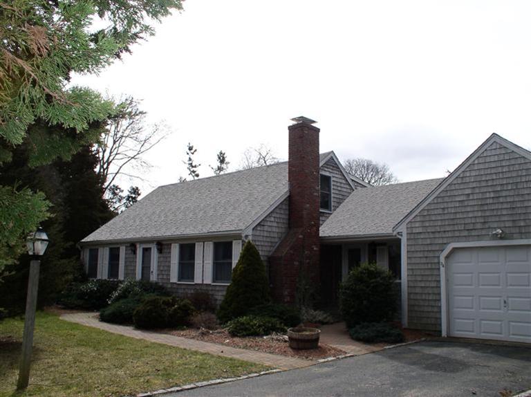 Cape-style home located in West Falmouth on Cape Cod. This home has a total of 7 rooms including 4 bedrooms and 2 baths. The first floor offers large kitchen , dining room , living room with fireplace, hardwood floors, sunroom, 2 bedrooms and a full bath. The second floor offers 2 more bedrooms and another full bath. Other features include central air, nice upgrades and an oversized 1-car garage. Close to bikepath, minutes to beaches . All this in West Falmouth