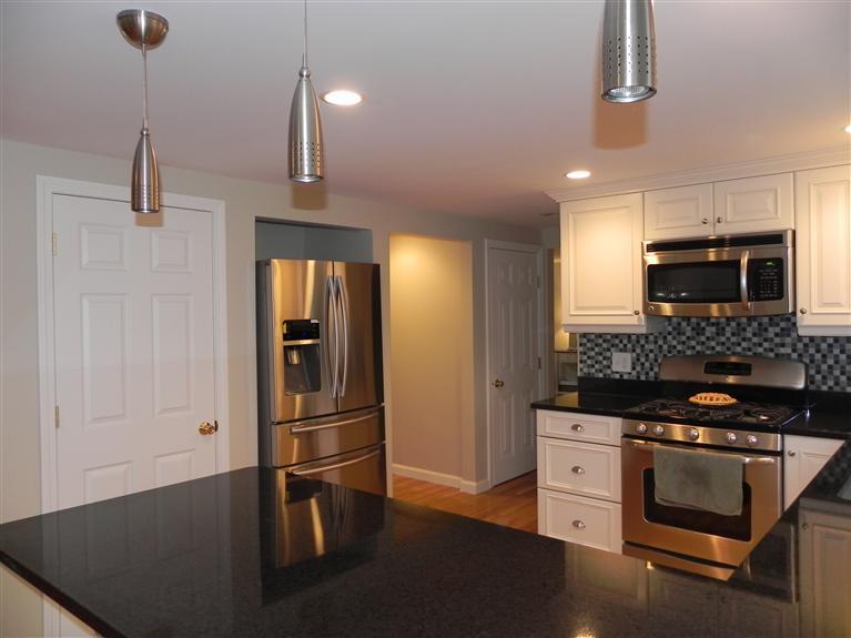 Greengate in Falmouth, like NEW, totally renovated, luxurious 4 BR, 2.5 bath Colonial with a den and home office. Large open space great room off the kitchen and dining areas with access to the deck. Kitchen with granite counters, stainless appliances, glass tile backsplash, recessed and undercounter lighting. Gleaming hardwood floors throughout and tile and marble in the baths. 1st floor master suite with bath and plenty of closets. Fireplaced living room and lots of extras. Accessible to the bike path making it easy to get to Woods Hole and enjoy the ocean and marshes along the way.