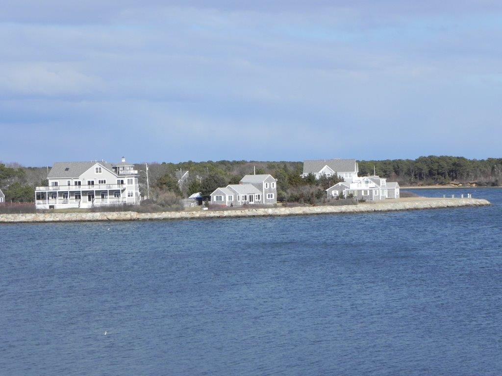 Stunning Waterfront Cape with deepwater dock, beach and panoramic views of Vineyard Sound. Custom features throughout, granite kitchen with island, Viking appliances, hardwood floors, lots of glass to porches and decks. Truly one of a kind.