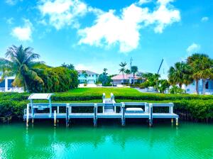 Opportunity Knocks... with this Rare find in Key Colony Beach! One of only a few remaining, east facing, cleared lots is now available for your to build your Island Dream Home. There is 80 foot of canal front and the 60 ft dock is already in place, saving you thousands of dollars and time. This wide, deep, clear canal is perfectly located, less than five minutes to Vaca Cut, the open Atlantic Ocean and Gulf of Mexico. In the city of Key Colony Beach, the GEM of the Florida Keys providing restaurants, marina, golf, pickleball, bocce ball, 3 playgrounds, basketball, horseshoes, police department, building department, post office and Sunset Park. Just 3.5 miles to the Marathon airport, 53 miles to the Key West International Airport and 87 miles to the Miami International Airport. It is your time...Dream, Design and Start Building NOW!