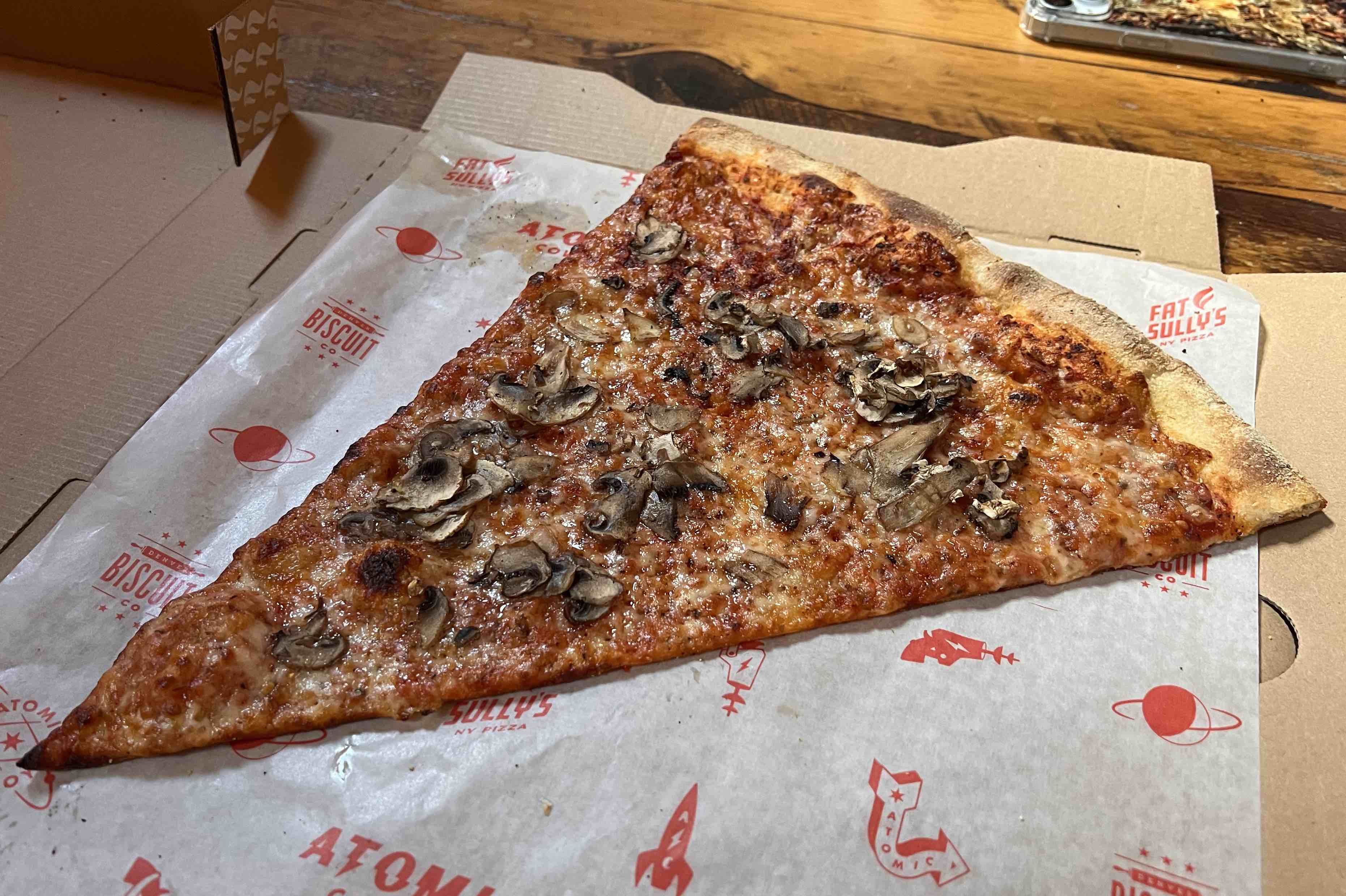 Atomic Cowboy home of Denver Biscuit Co & Fat Sully's NY Pizza