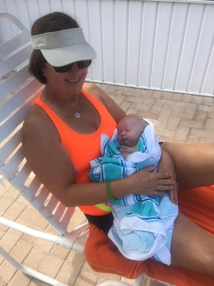 Sitting at the pool ....84 degrees ... loving up my Kylie!