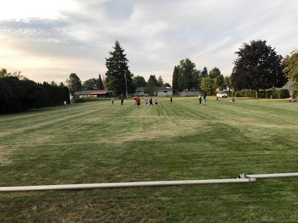 The Youth Group from my church. They are playing Baseball with a Beach ball! I called them, the” Koots & kids”! Pan and I watched them, while we were on our walk. That’s the churches back yard, taken from my Apt back yard!