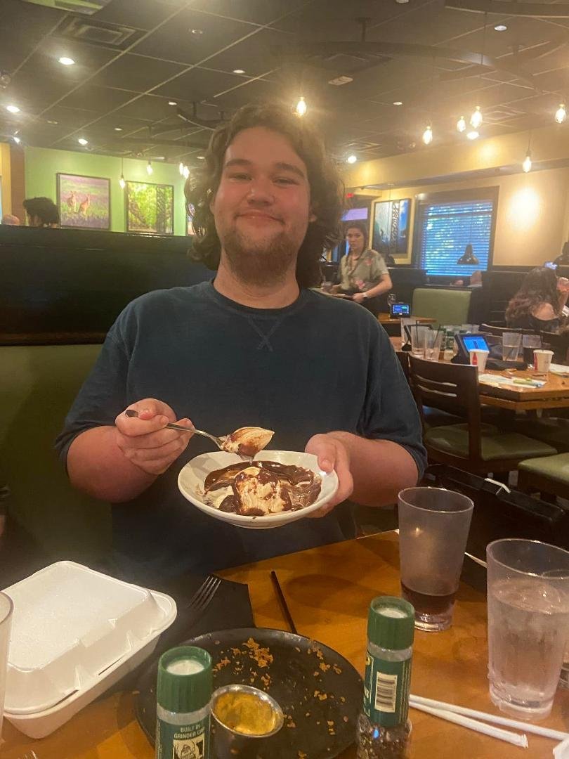 Brian’s birthday dessert at Outback Steakhouse. His brother Michael got one too.