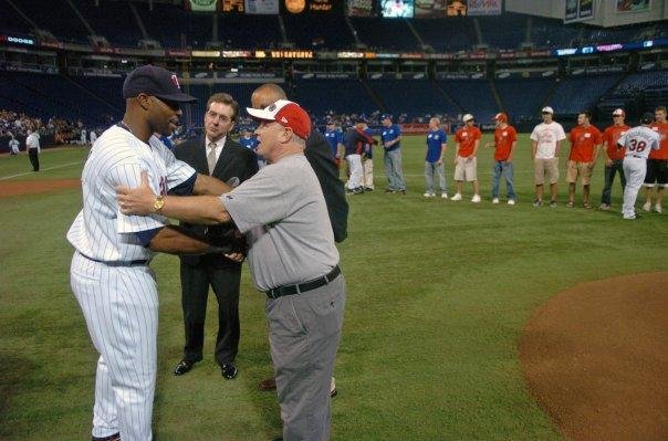 2007 giving Torii an award from Little League Baseball.