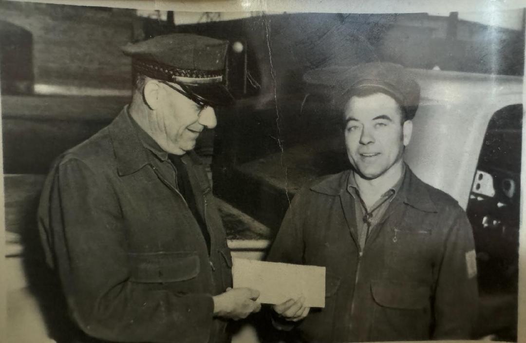 Probably early 60's. My dad Bill Deshner receiving an award from Hank Miller, Chief Fire and Security, Anaconda Company. Sam Holden was co-chief. Dad eventually replaced Hank and served with Sam Holden. Sam was then replace
