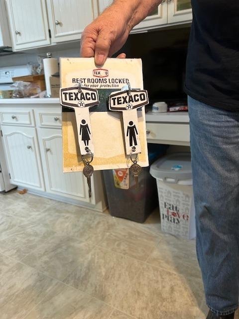 I collect things to hang in my garage. Automotive things . Well this was about 350 on ebay. So I copied pics off the net. Bought some plexi glass. And made my own. I found Texaco keys on ebay. All total I have in it is abo