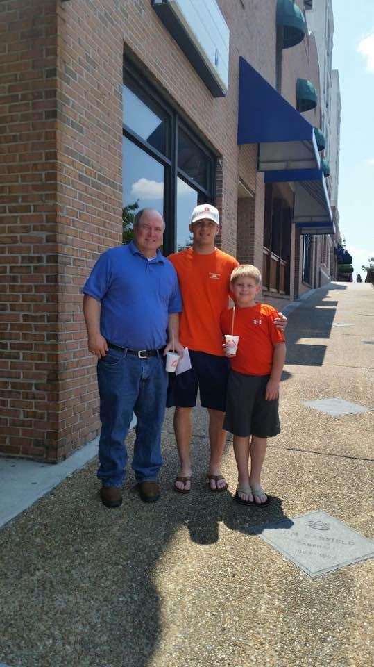 My husband with two grandson in downtown Auburn Al this is were we are planning on retiring